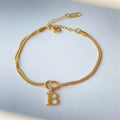 Bracciale con iniziale e nodo d'amore, acciaio inox