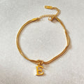 Bracciale con iniziale e nodo d'amore, acciaio inox